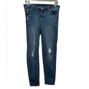 Distressed Mid Rise Ankle Skinny Jeans